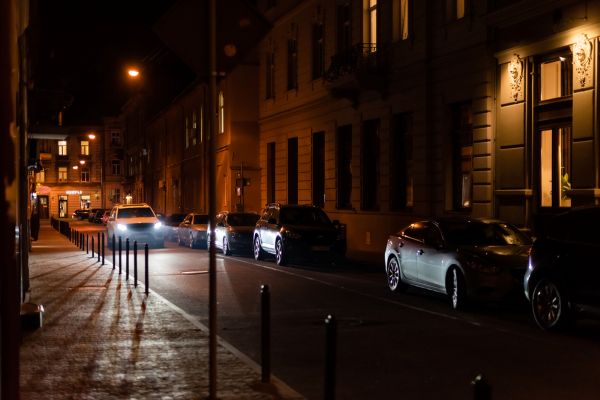 Image of Cars on dark street at night