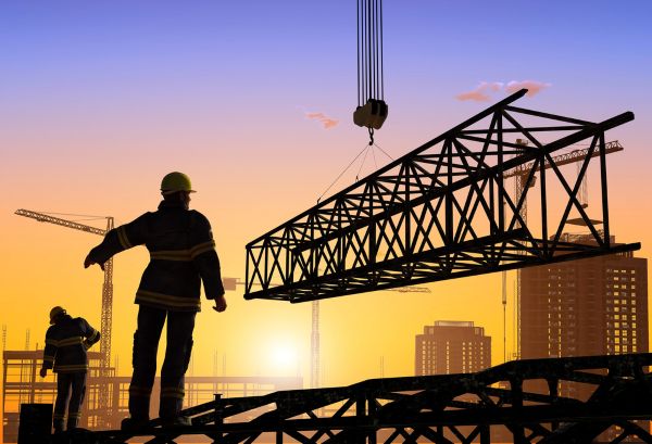 Image of construction worker at sunset