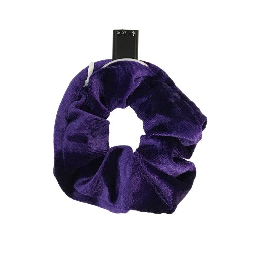 a small zipper compartment on the scrunchie hair tie hides an incredibly small audio recorder